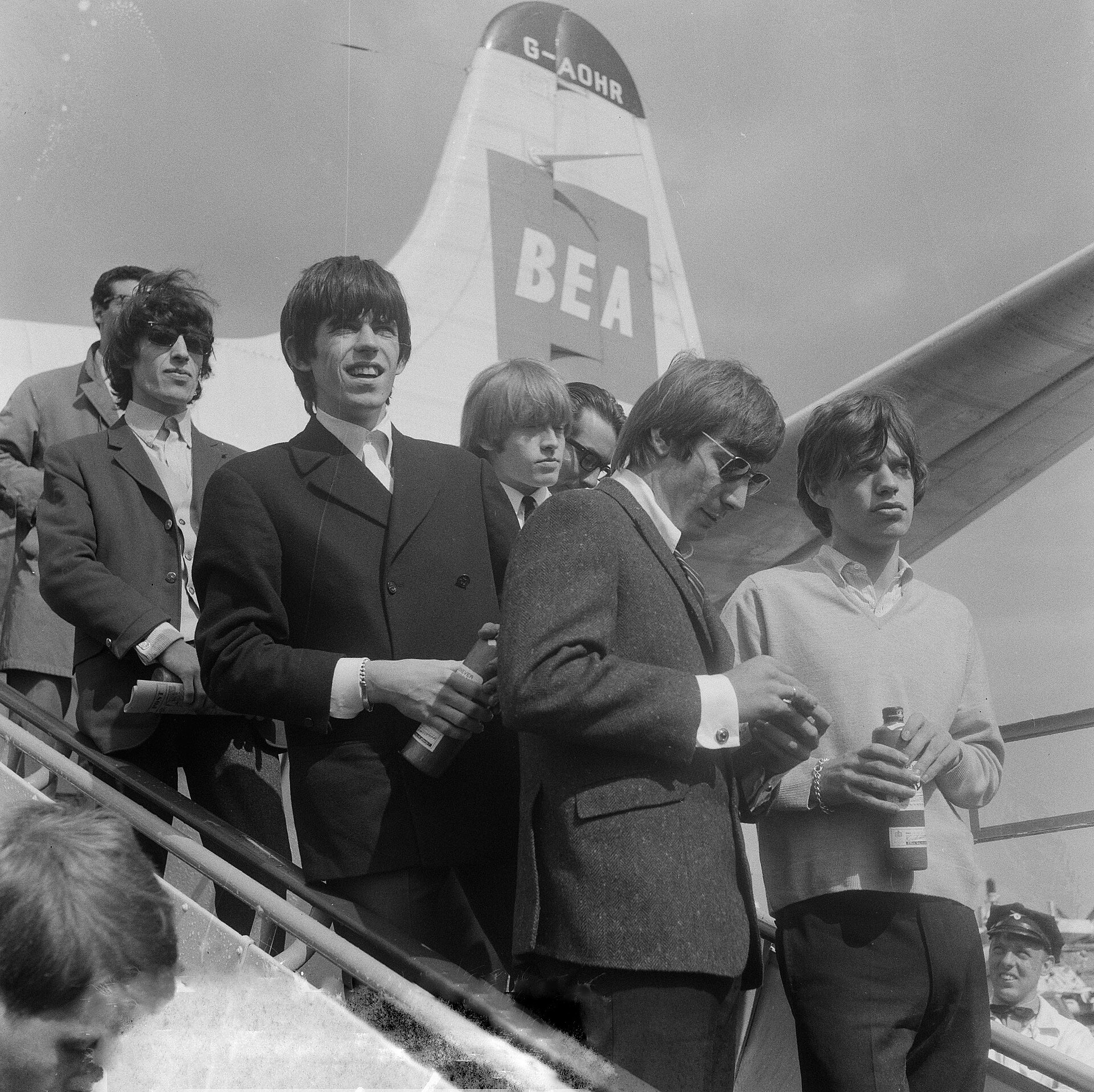 More details The Rolling Stones at Amsterdam Airport Schiphol, Netherlands, in 1964. From left to right: Wyman, Richards, Jones, Watts and Jagger