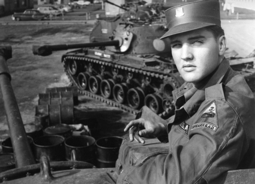 Elvis Presley poses for the camera during his military service at a US base in Germany