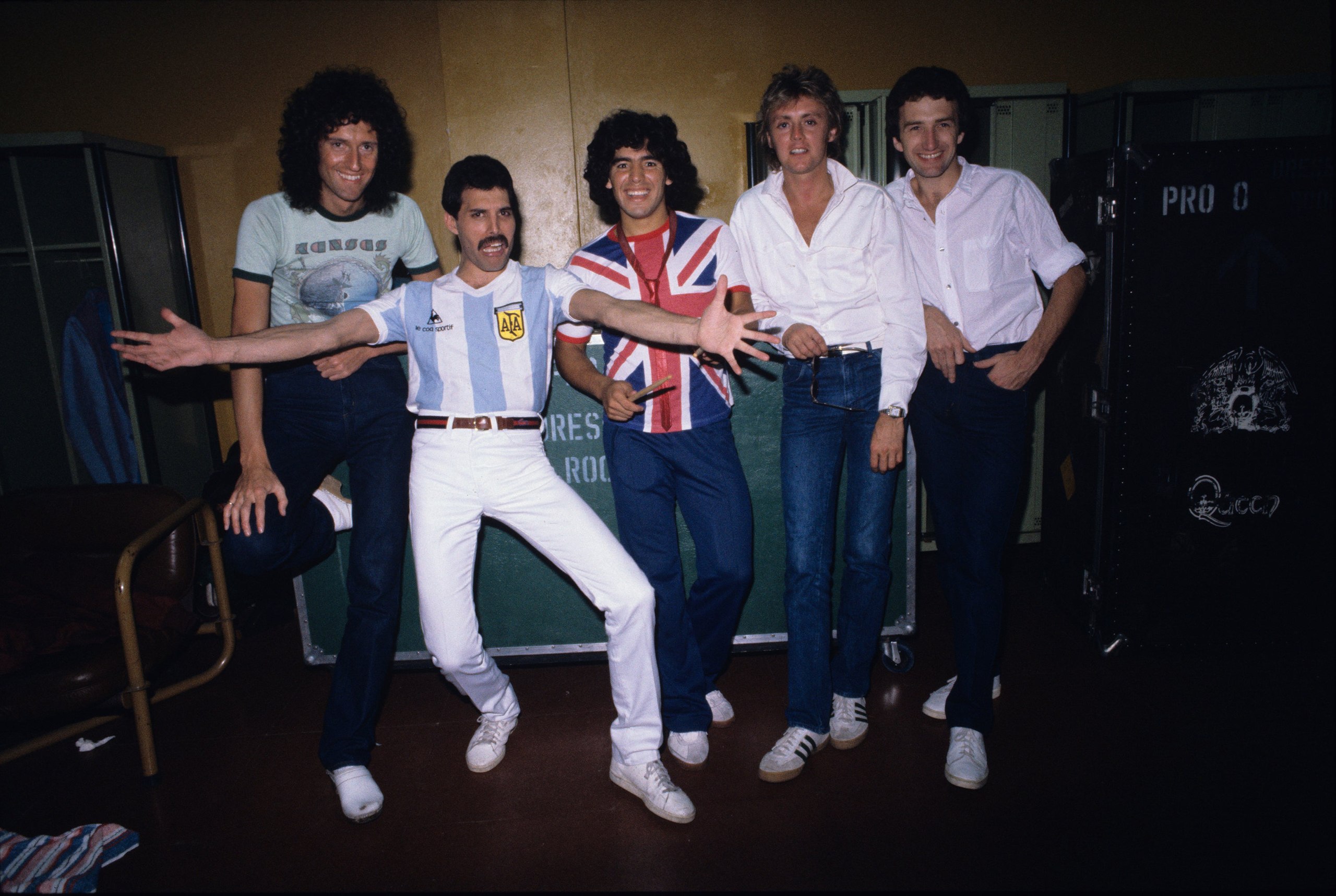 English rock band Queen (with Freddy Mercury in an Argentina jersey) meeting Diego Maradona (wearing an Union Flag jersey) before their last concert in Argentina during the The Game Tour.
