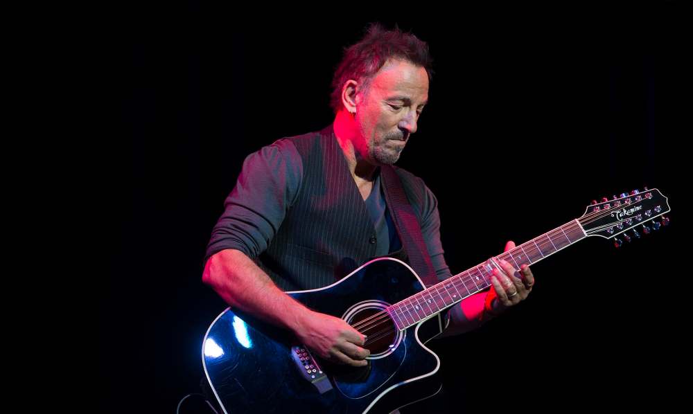 Bruce Springsteen performing during the Stand Up for Heroes special in 2014