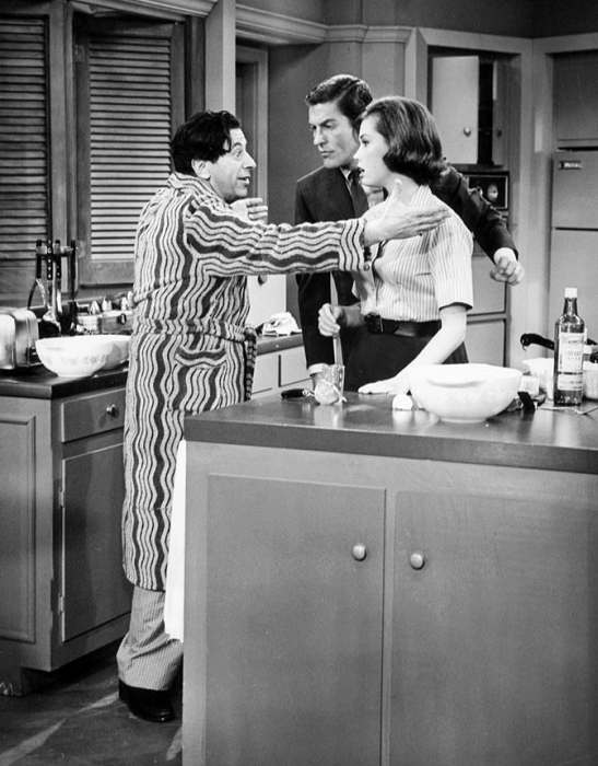 The Dick Van Dyke Show. Pictured are Buddy (Morey Amsterdam) and Laura (Mary Tyler Moore) and Rob (Dick Van Dyke) Petrie