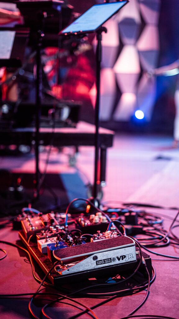 Pedalboard on a stage during a concert image