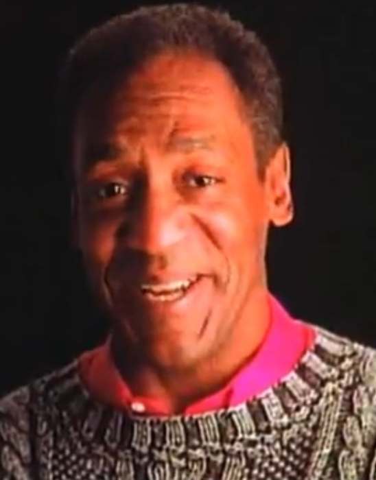 Bill Cosby wearing a sweater in 1990, similar to the ones he wore on The Cosby Show in the role of Cliff Huxtable