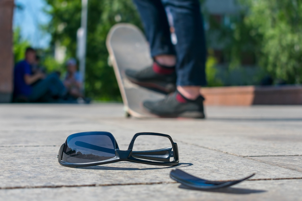 Broken skateboarder sunglasses