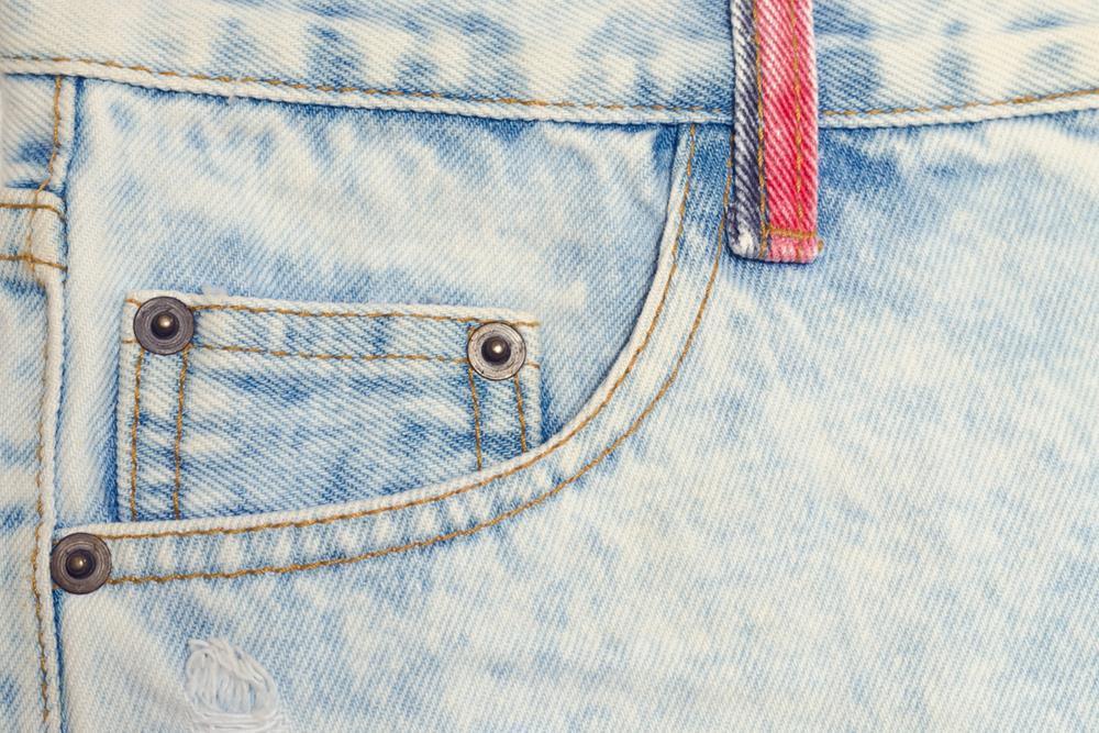 Acid wash jeans close up