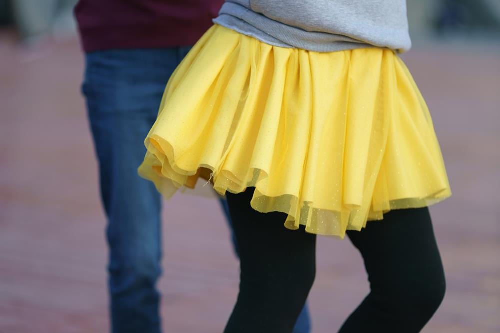 Wearing mini skirt with leggings
