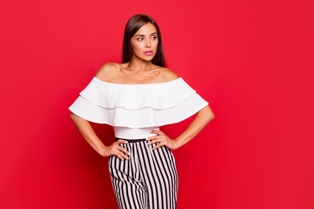 Woman wearing an off-the-shoulder top