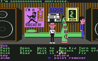 Bernard and Dave visit the green tentacle in the mansion. The game displays dialogue above the scene and the point-and-click command interface below it
