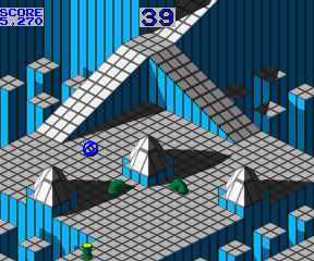 The blue, player-controlled marble traverses an isometric course. Scores and available time are tracked at the top of the screen