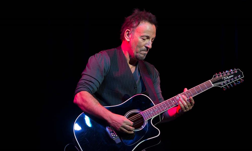 Bruce Springsteen playing the guitar