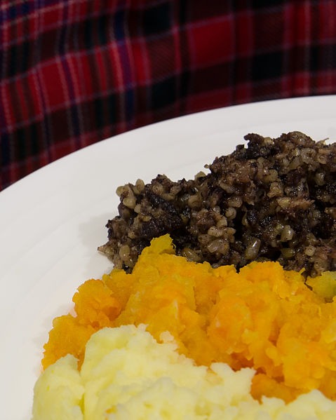 Haggis, turnips and mashed potato served on a plate
