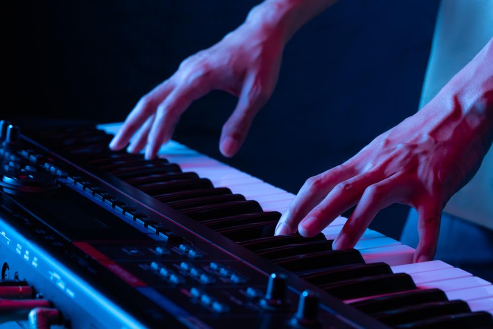 Man playing a keyboard