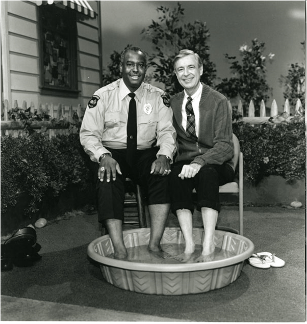 Rogers and François Clemmons (black police officer) reprising their famous foot bath in 1993