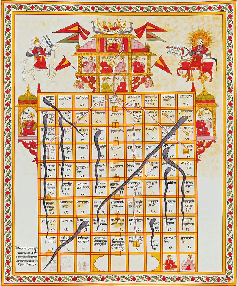 an ancient game of snakes and ladders