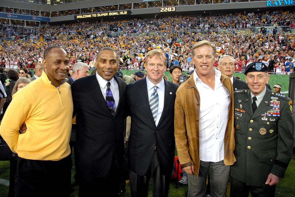 John Elway (second from right) at Super Bowl XLIII with Lynn Swann, Roger Craig, Roger Goodell, and General David Petraeus, 2009