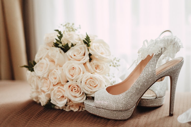 silver glittery platform heels with white roses