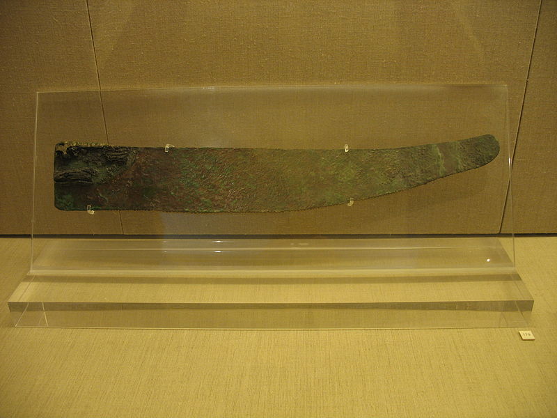Bronze-age saw blade in a museum display image