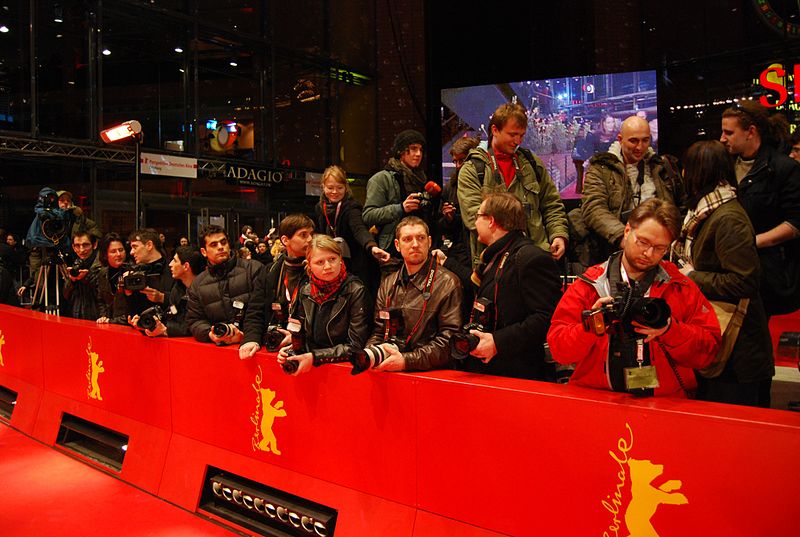 photographers waiting for the celebrities to walk the red carpet in the Berlinale