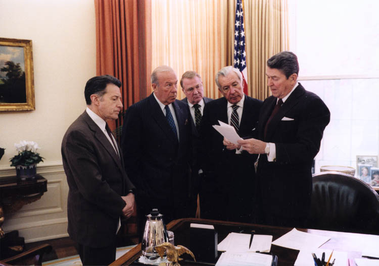 President Ronald Reagan in discussion with his remarks on the Iran-Contra affair