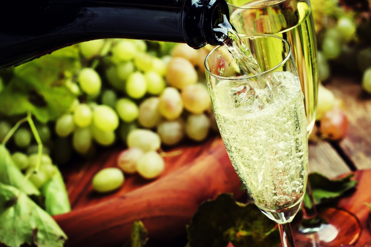Champagne, Grapes, Prosecco, Wine, Alcohol-Drink, Bubble, Carbonated, Champagne Flute, Drink, Luxury, Food and Drink, Glass-Material, Holiday-Event, Pouring, Restaurant, Table, Vine-Plant, Wineglass, No People, Old-fashioned, Party-Social Event