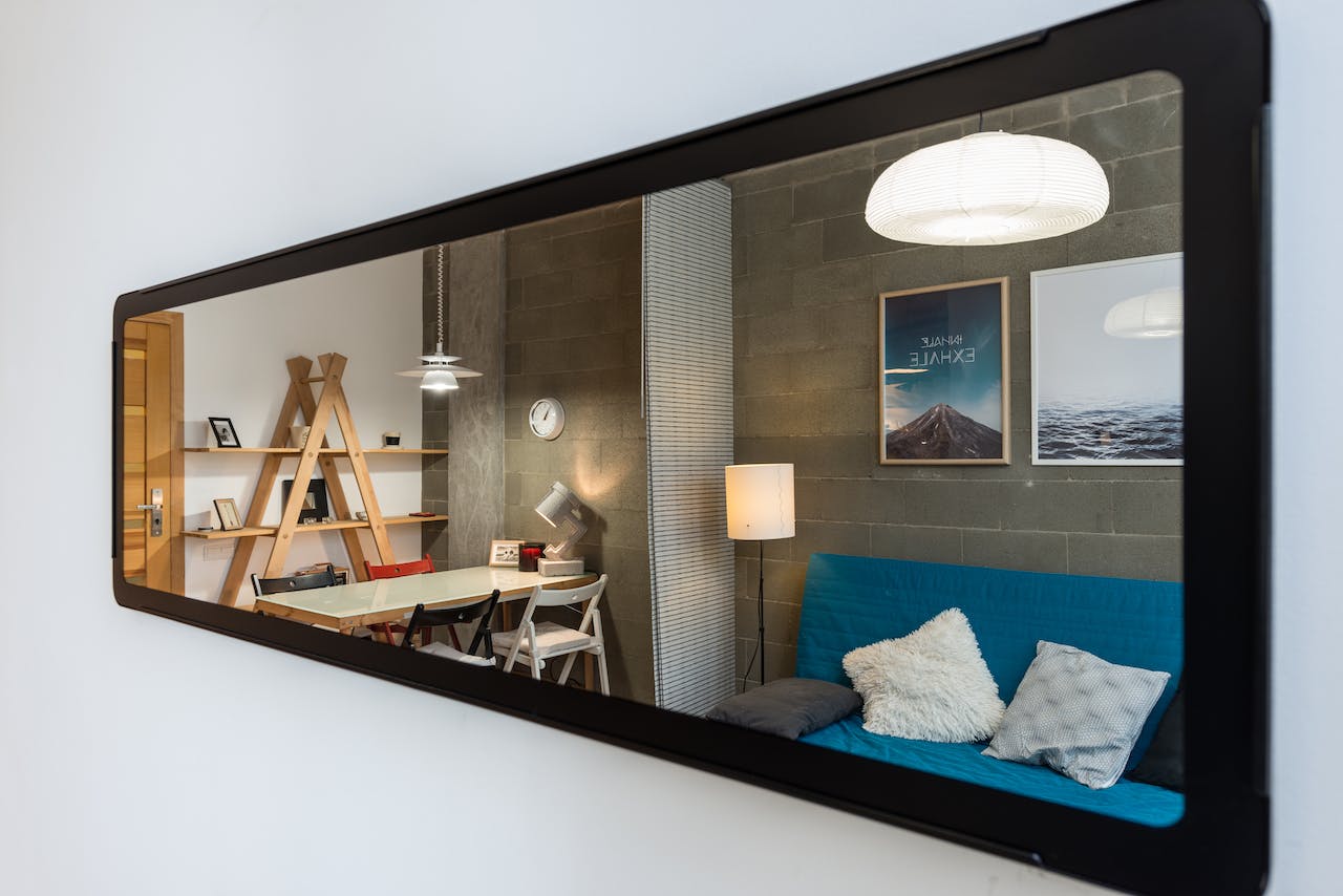 How to Use a Big Room Mirror to Create the Illusion of Space