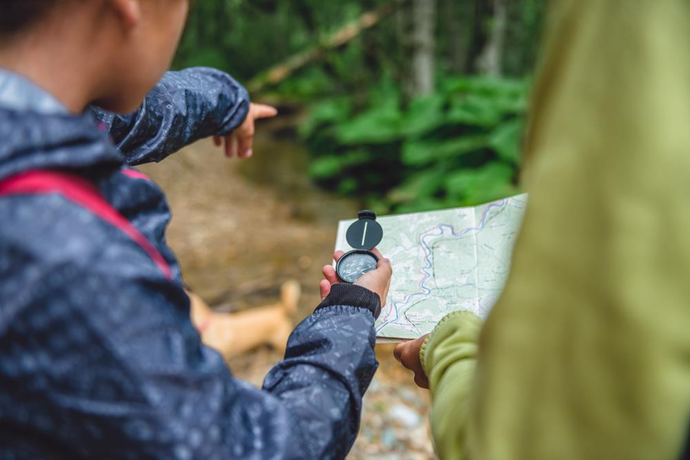 Using a map and compass while hiking