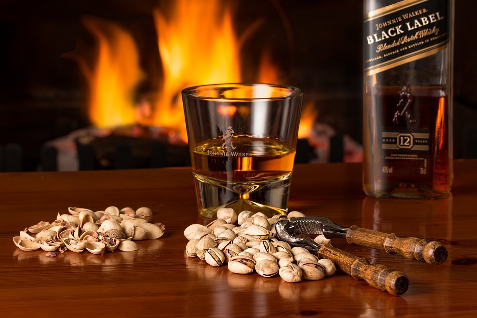 Johnnie Walker Black Label whisky, and nuts
