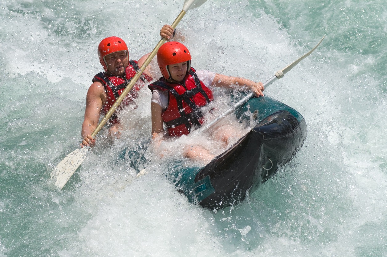 "Antalya, Turkey - July 2,2006:Two people rafting on Koprucay River which is one of the most popular places for rafting in Turkey. Koprucay River runs to the Mediterranean Sea through straight canyons of Taurus Mountains."