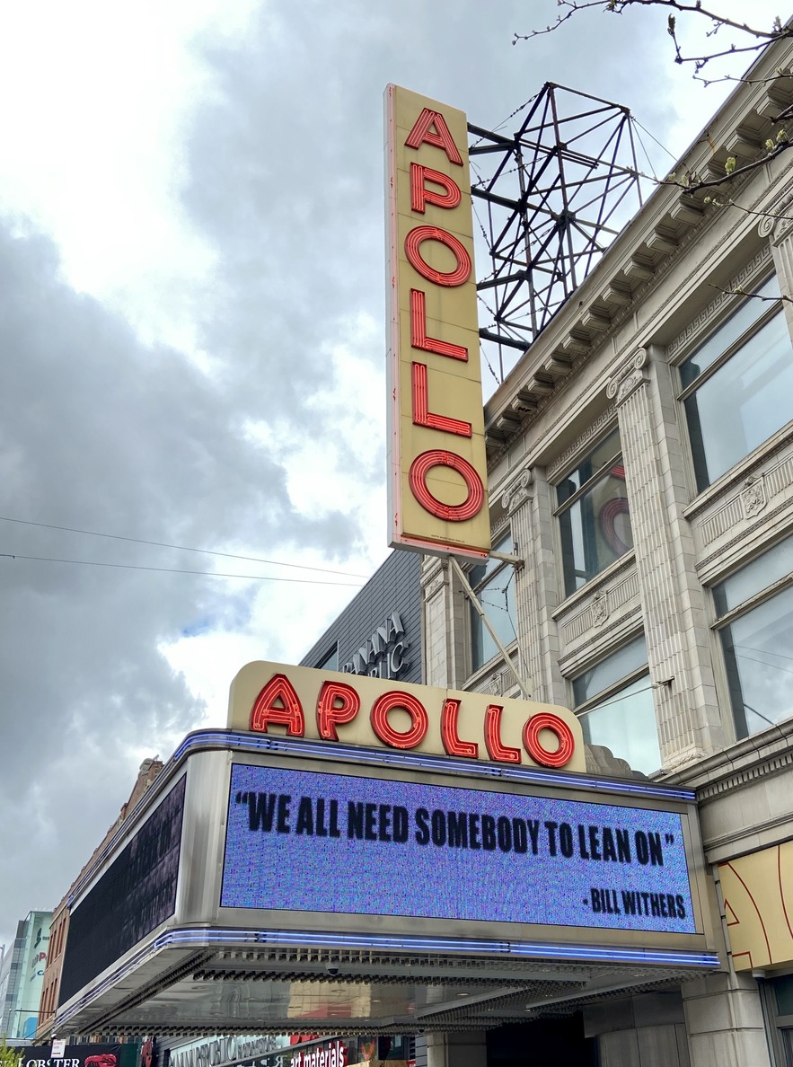 New York, NY USA - April 18, 2020: "We All Need Somebody to Lean On" quote from singer/songwriter Bill Withers on the historic Apollo Theater marquee in Harlem, USA, during the first wave of the Covid-19 pandemic
