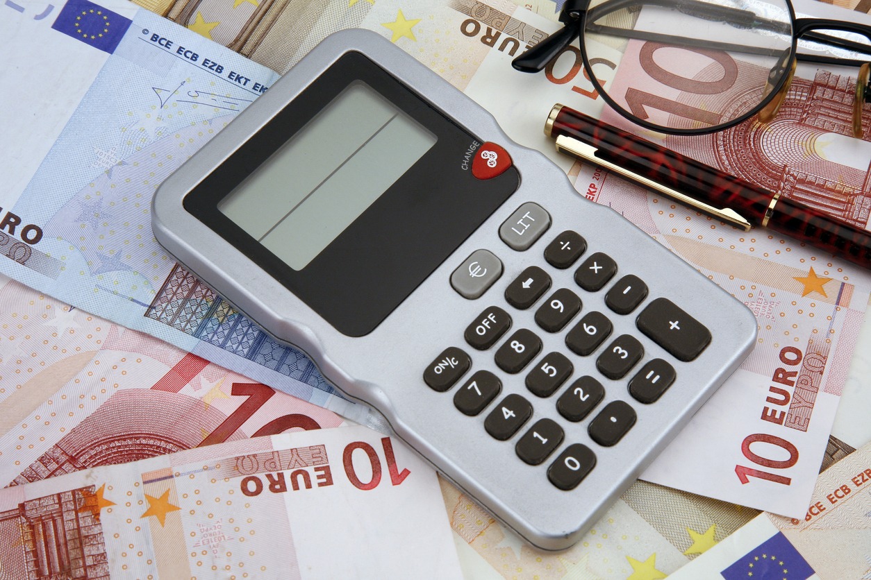 pocket calculator with euro banknotes