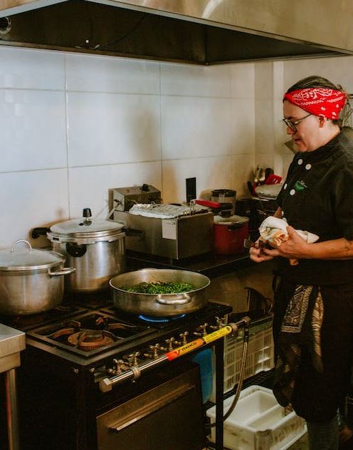 A Chef Cooking in a Restaurant Kitchen