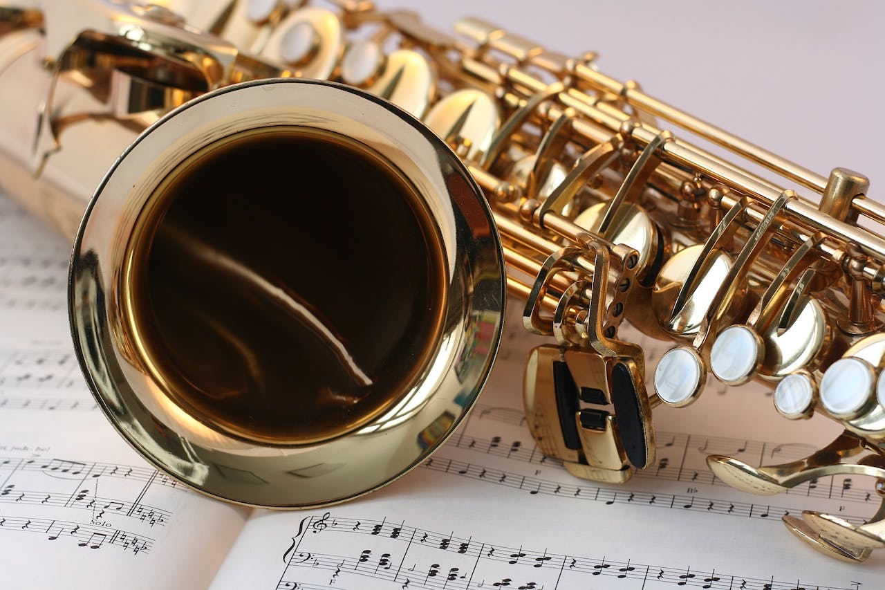 a saxophone on a music sheet