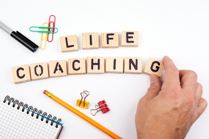 life coaching. Wooden letters on a white background