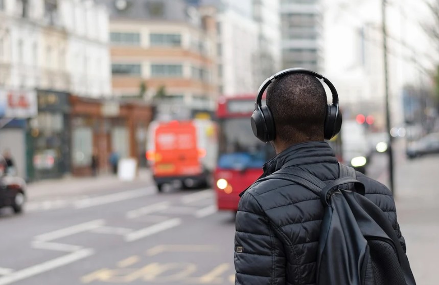man wearing headphones outdoors