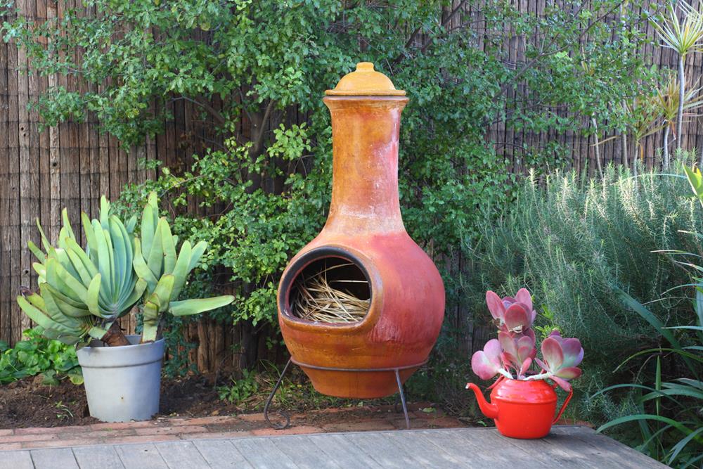 A chimenea for keeping warm, cooking and décor in the backyard