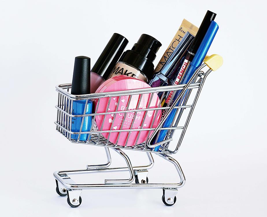 Cosmetic products on a small shopping cart