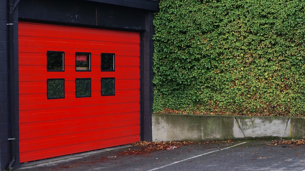 red metal garage door image