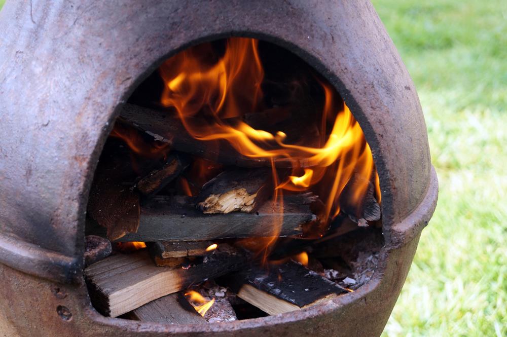 Wood burning in a chiminea