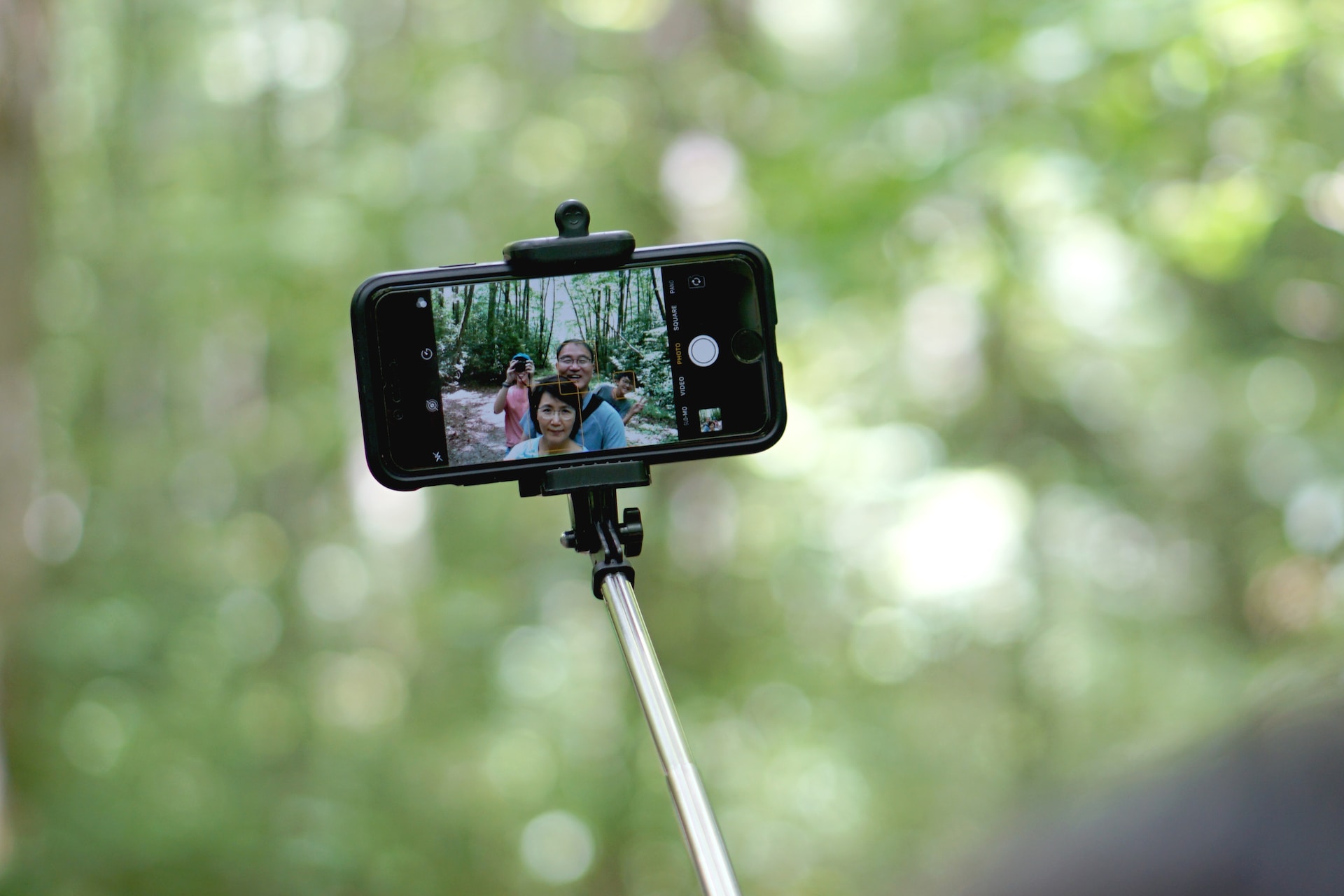 A selfie stick is used to take photographs or video by positioning a digital camera device, typically a smartphone, beyond the normal range of the arm