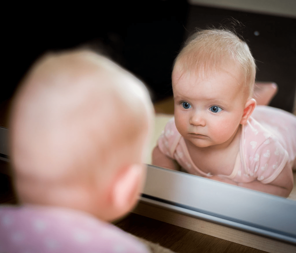 How strange is it for babies to see them selves for the first time in the mirror