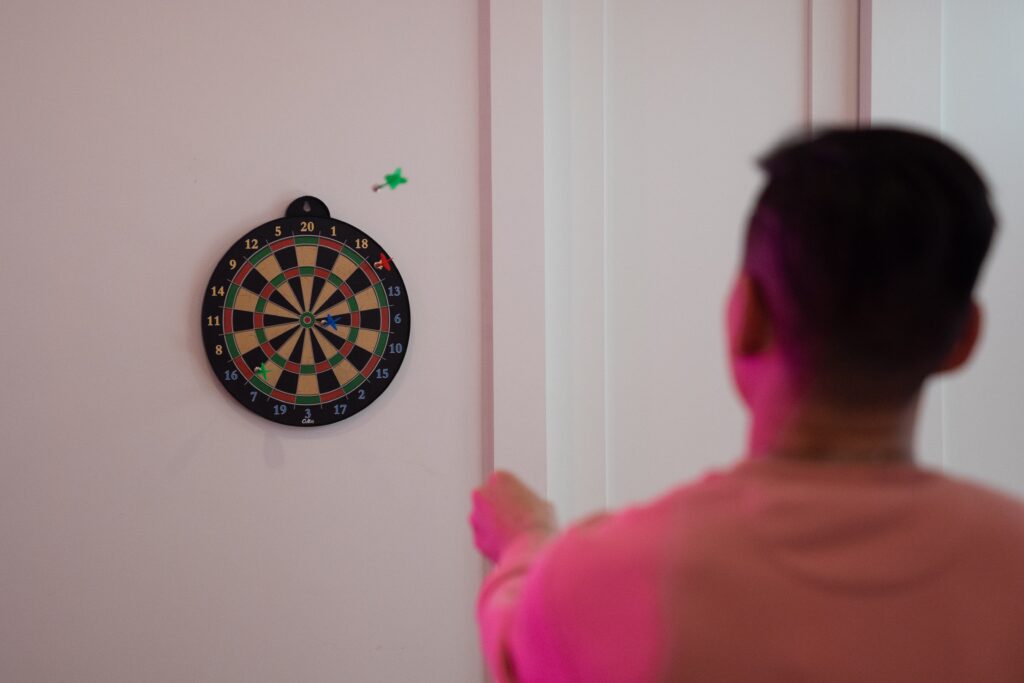 A person playing darts image