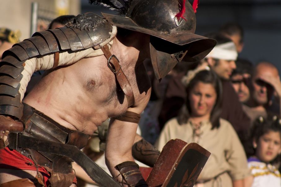 a street performer wearing gladiator armor
