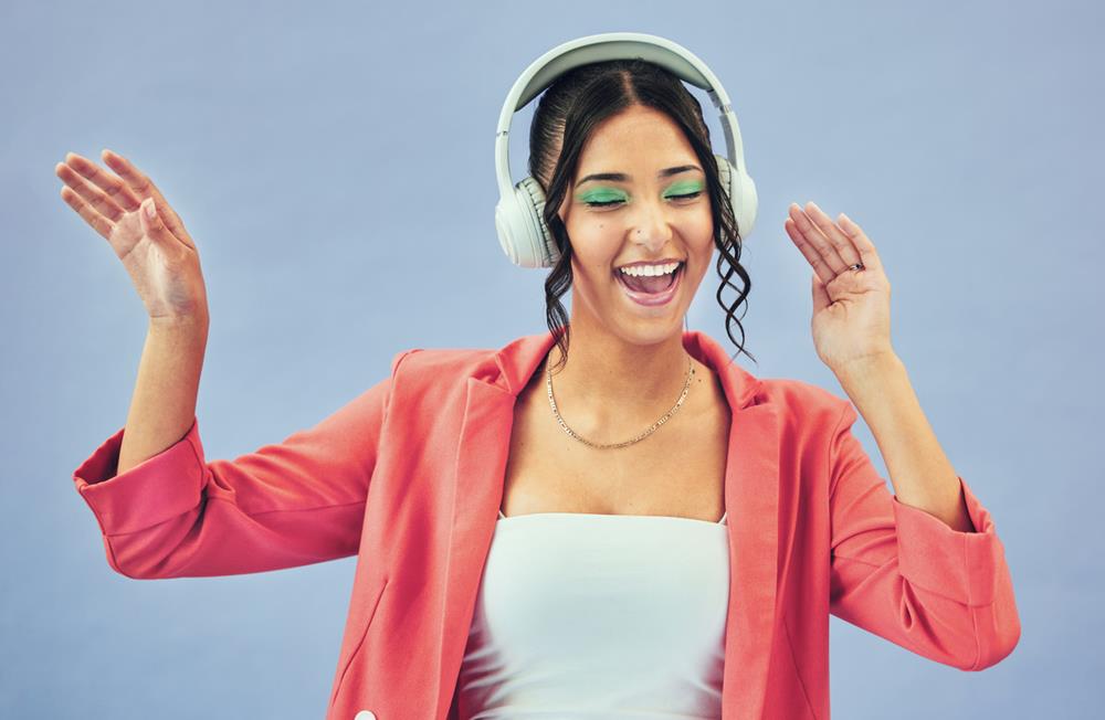 Woman enjoying the music with her headphones