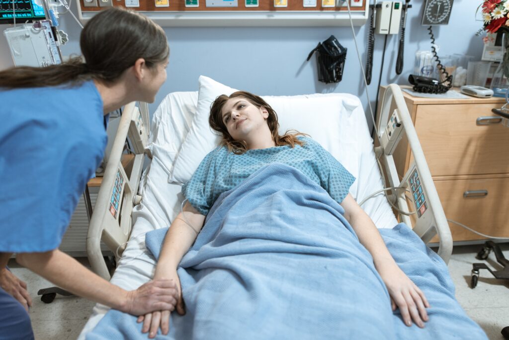 woman talking to a patient image