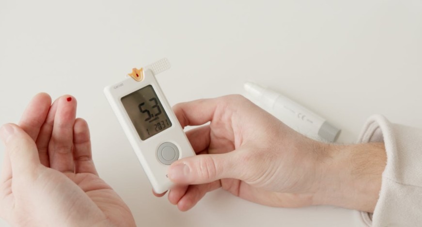 checking blood sugar level using a glucometer