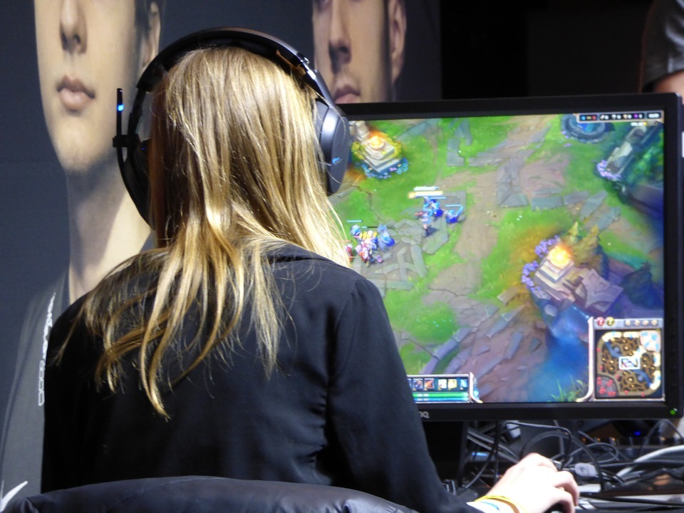 woman playing a game on PC