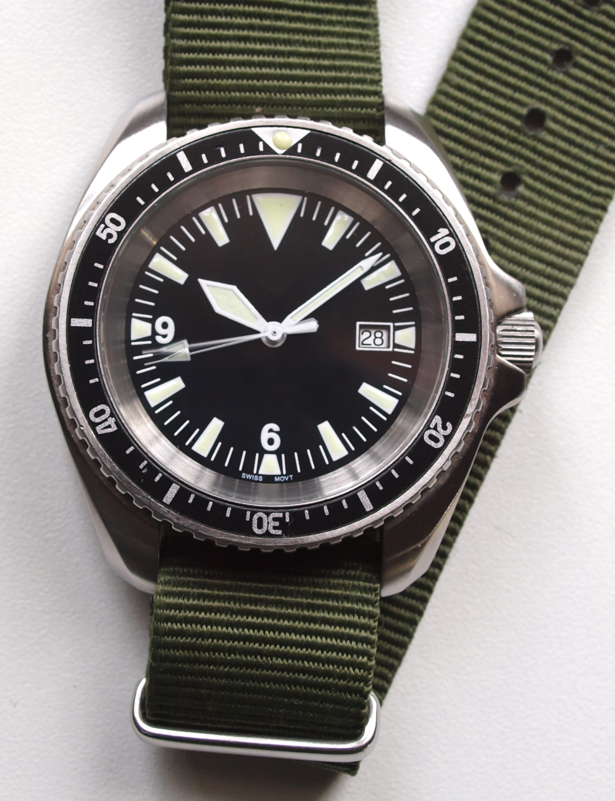 classic military diver watch black dial and nato green strap