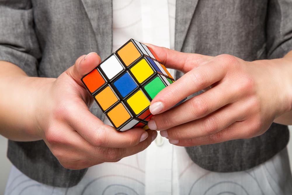 Person playing Rubik's cube
