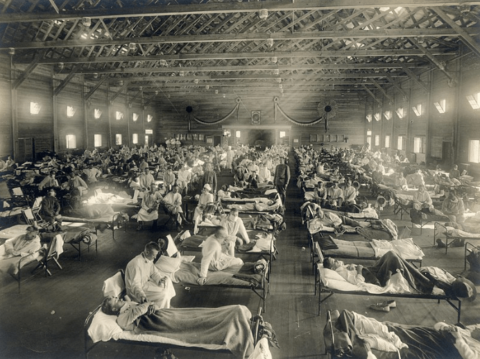 Image showing soldiers from Fort Riley, Kansas, ill with Spanish flu at a hospital ward.