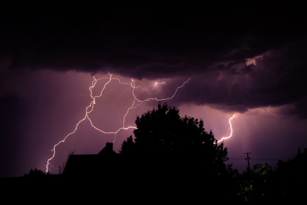 lightning bolt in a purple-ish sky